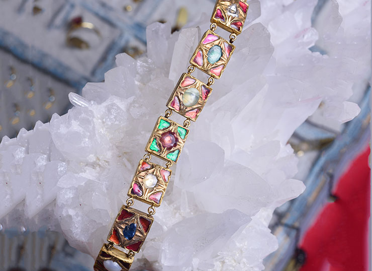 Vintage 80-year-old 18ct gold bracelet with emeralds, tourmalines, opals, rubies, pearls, and diamond